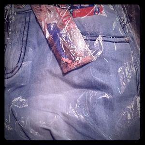 Ribbon laced ripped jeans